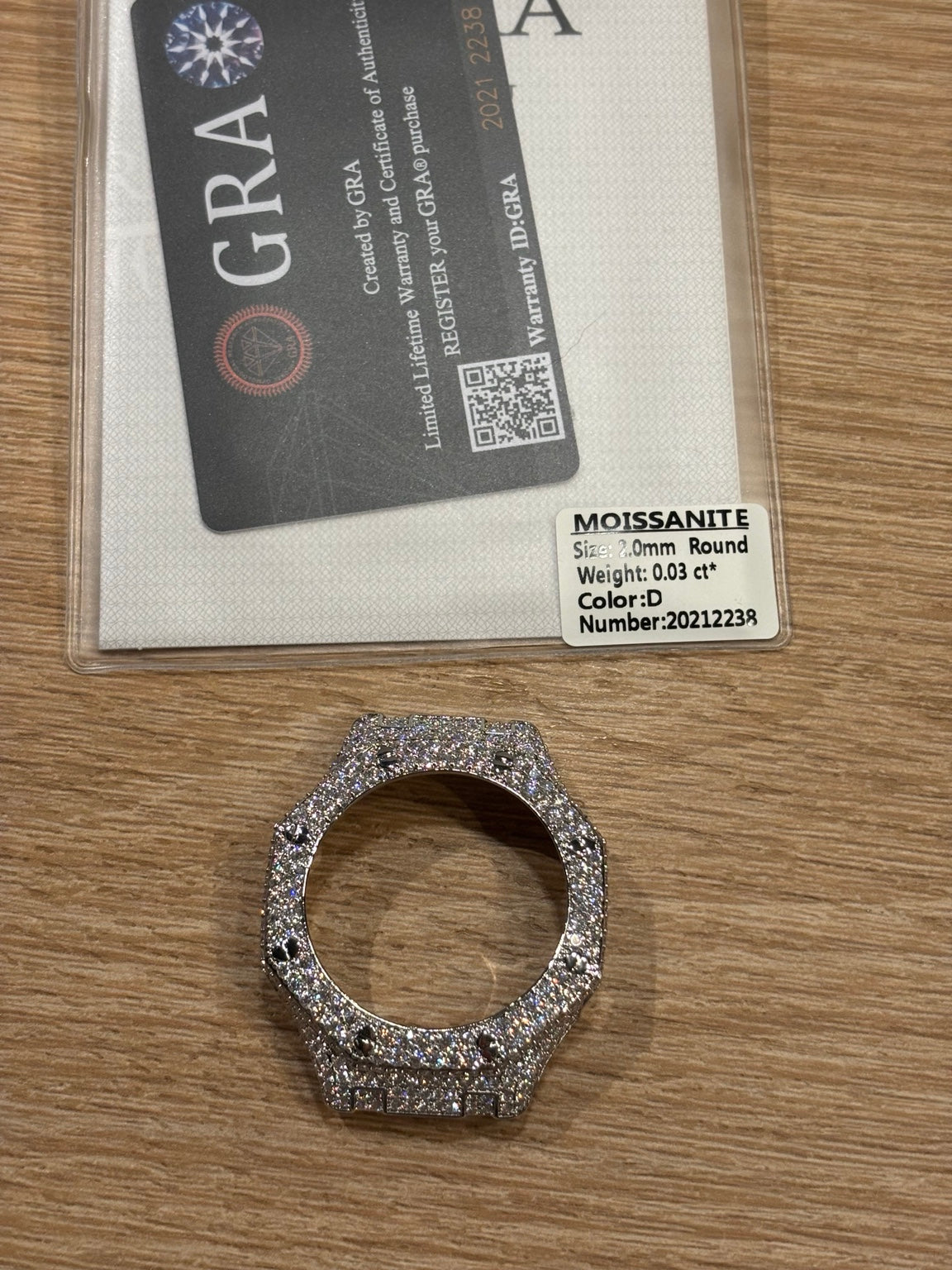 Moissanite GA-2100 bezel cover shown with the included GRA card
