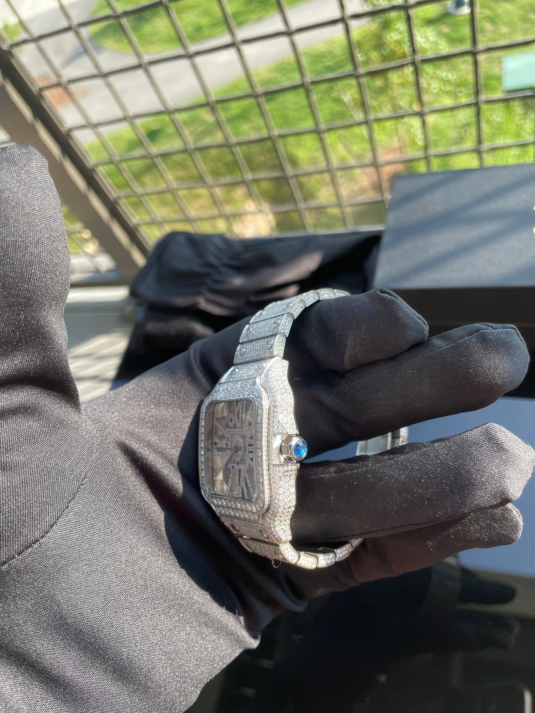 Side view of the skeleton watch showing the blue crown accent