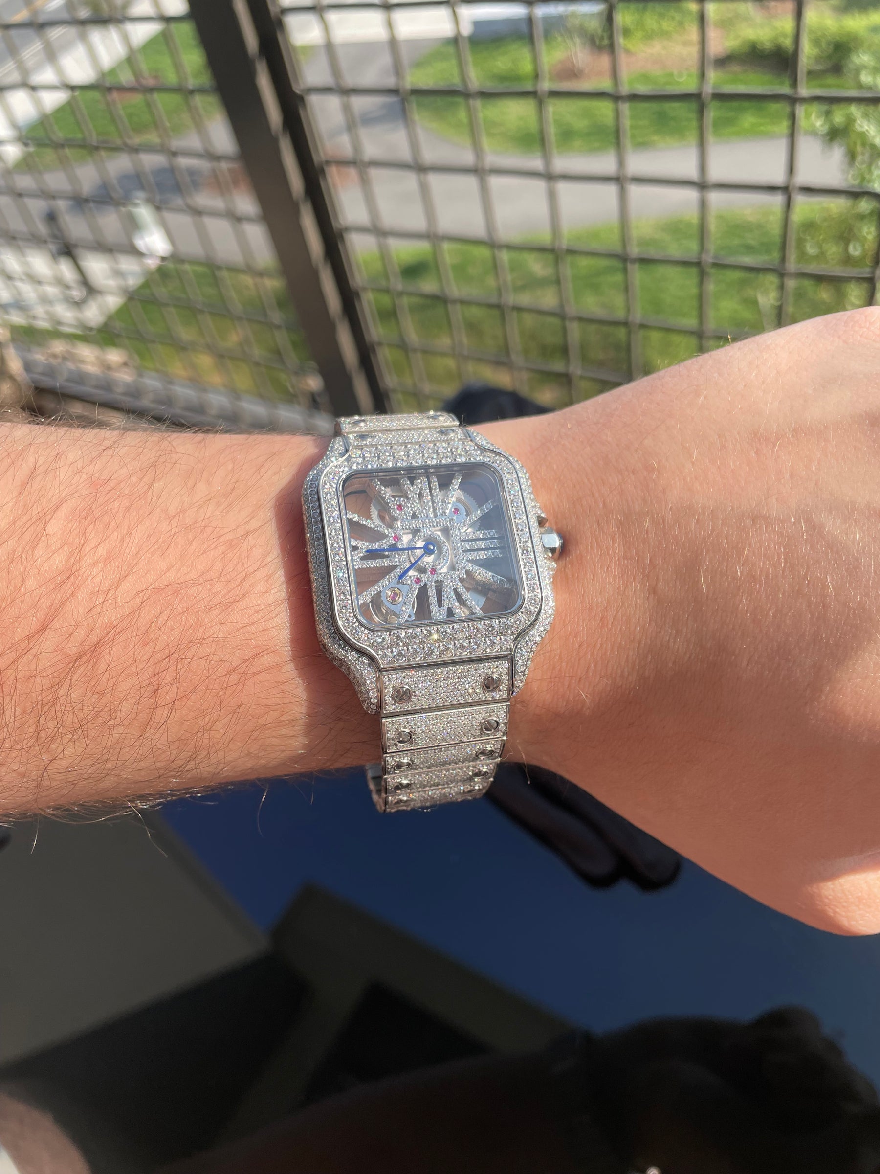 Full moissanite skeleton quartz watch worn on the wrist
