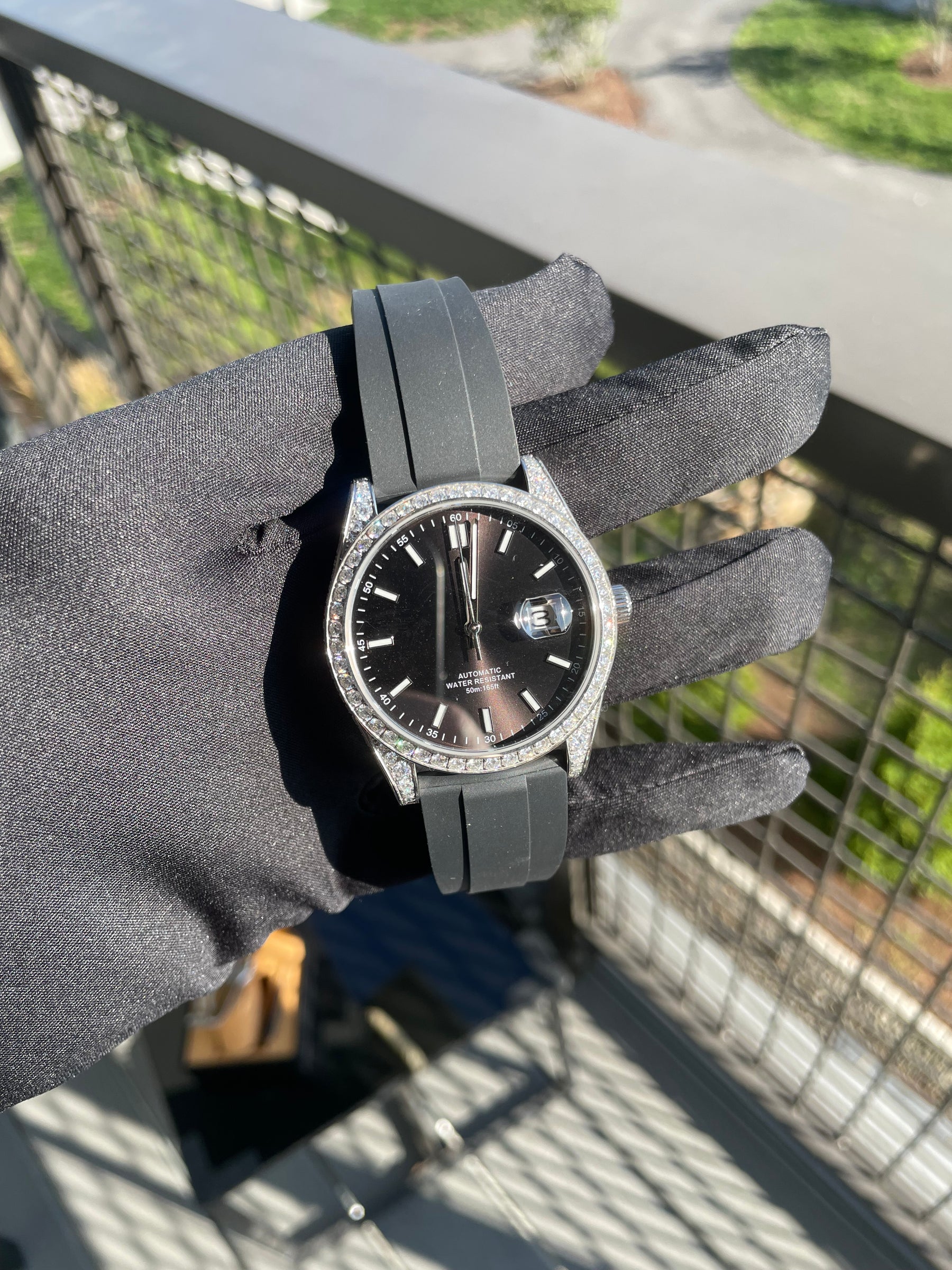 Front view of S1196S 8.15 CT moissanite automatic watch with black dial