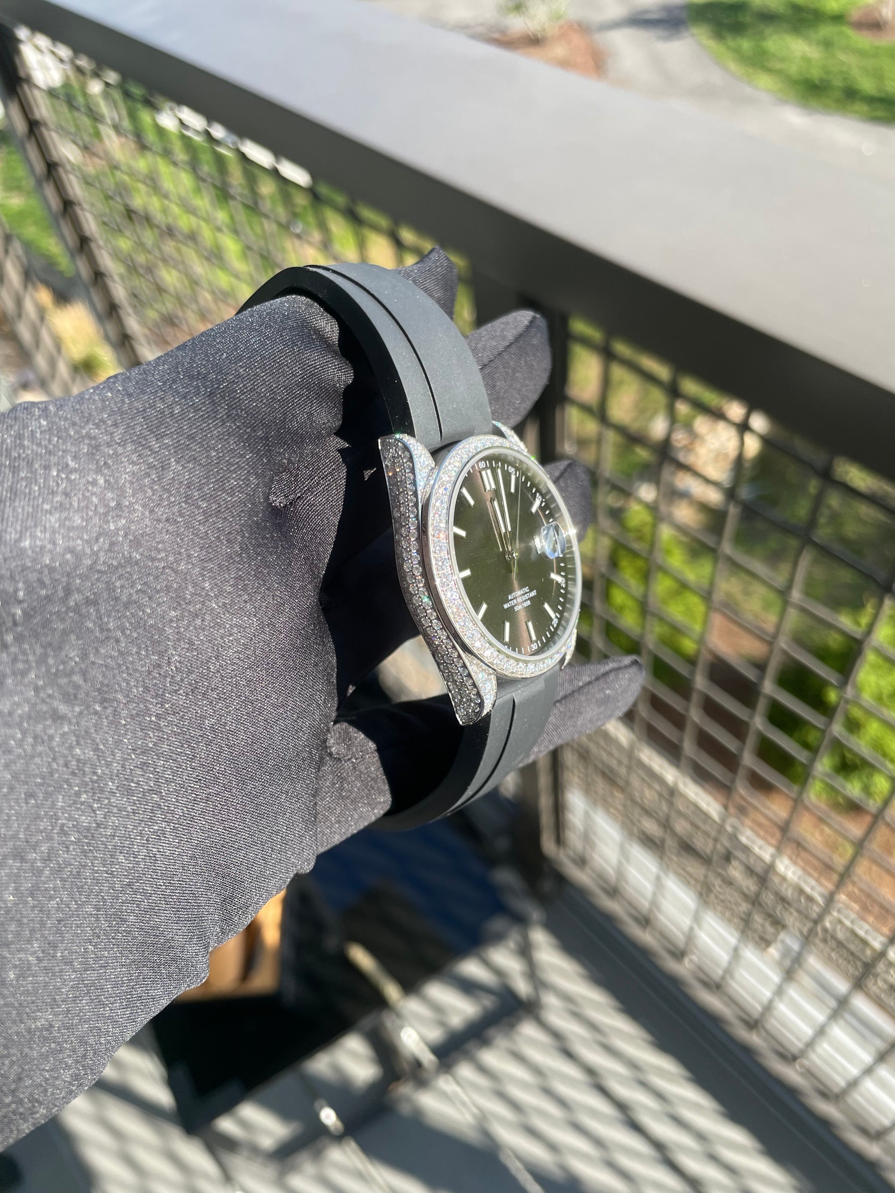Angled view of the moissanite-set bezel and lugs on the S1196S automatic watch