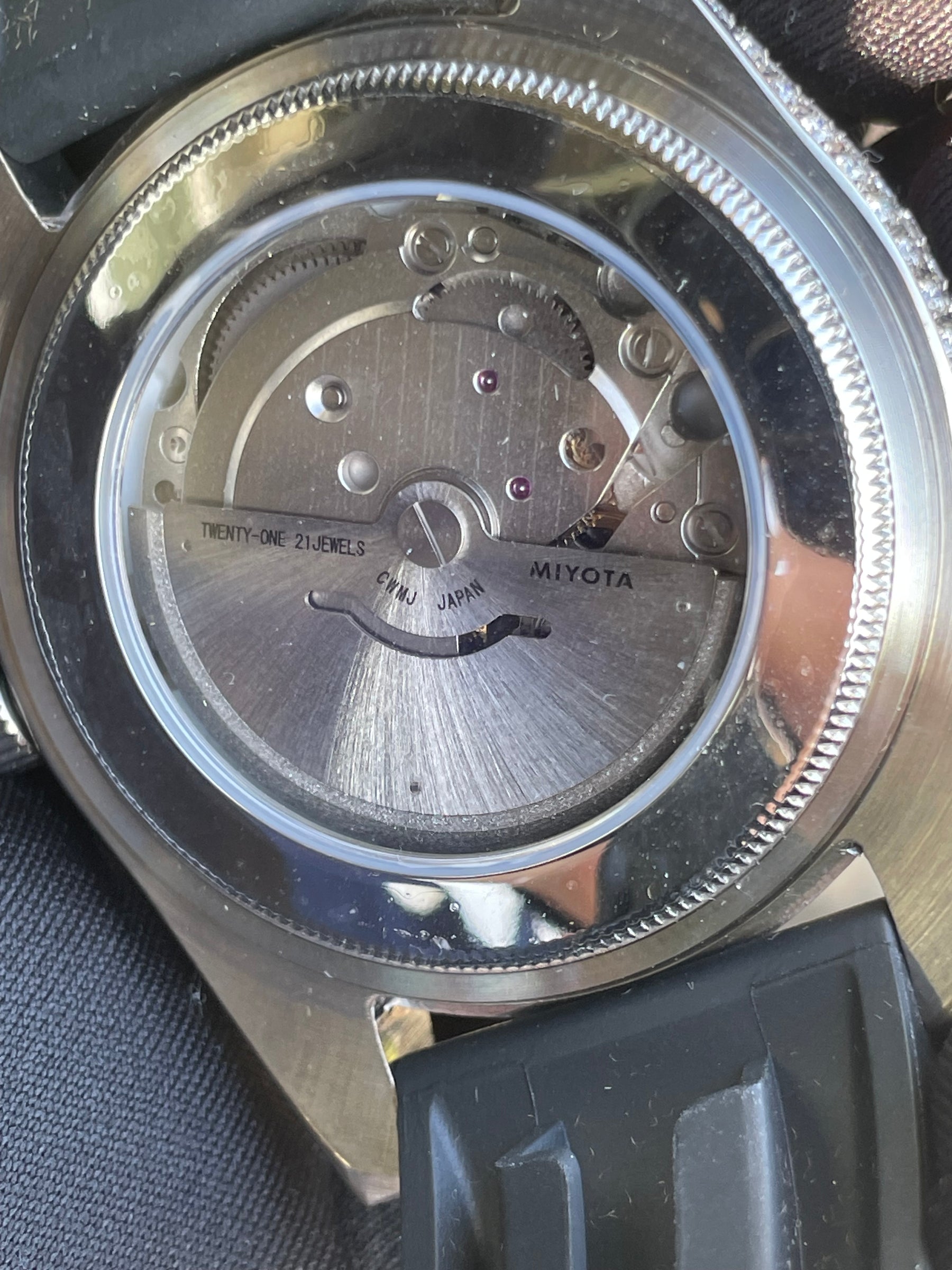 Miyota 8215 automatic movement visible through the S1196S display caseback